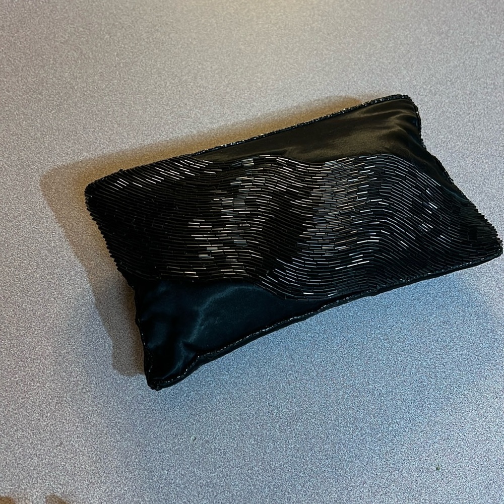 Vintage black satin evening bag with beautiful fluted beadwork.